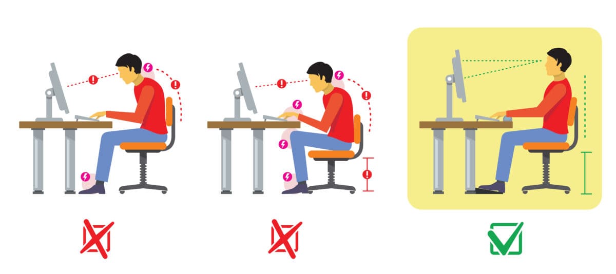 So wählst du den besten und optimalen Trading-Monitor - der ulitmative Guide (2026) Das Bild zeigt, wie man ergonomisch am Schreibtisch sitzt und den Monitor ausrichtet.